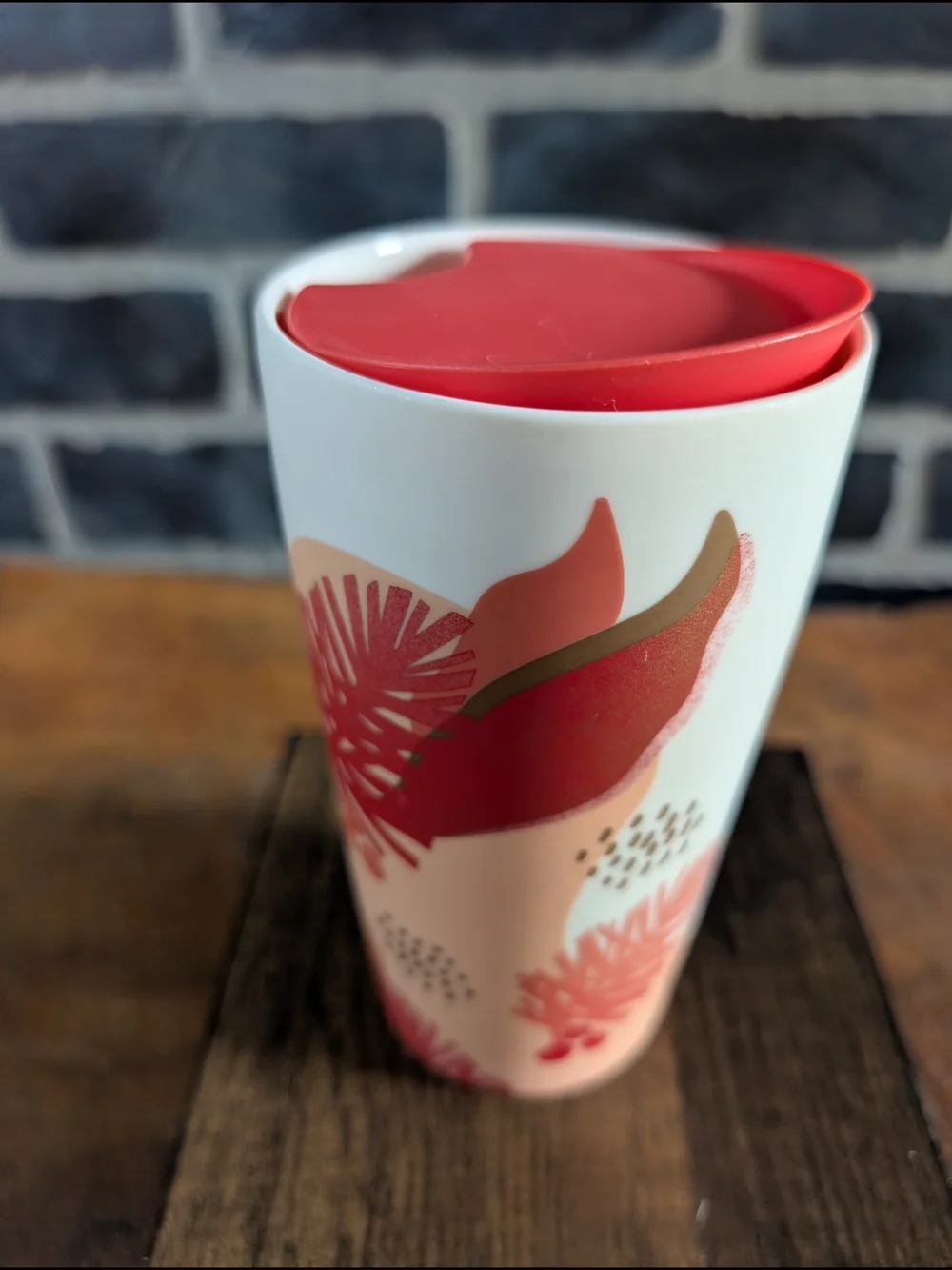 Starbucks White Ceramic Travel Mug with Coral Lid and Pinecone Accent